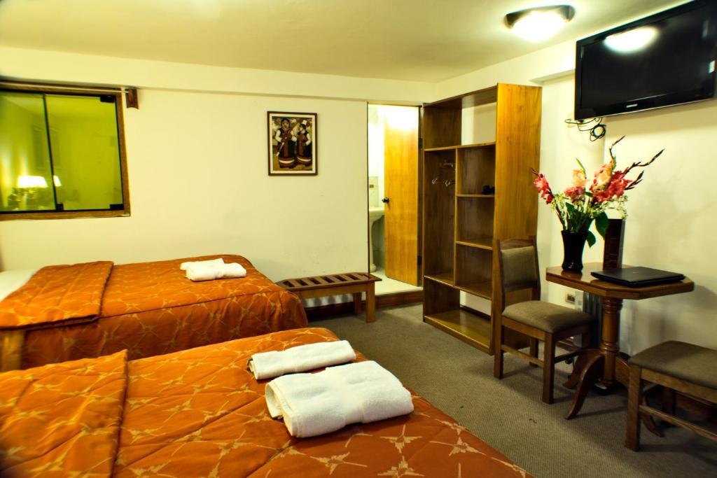 Amerinka Hotel Boutique Cuzco Habitación foto